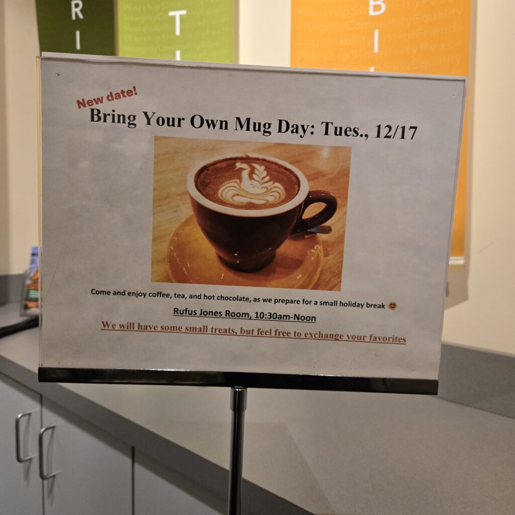 A sign says Bring Your Own Mug Day, Tuesday, December 17.