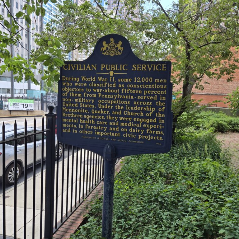 Historical marker says: During World War II, some 12,000 men who were classified as conscientious objectors to war—about fifteen percent of them from Pennsylvania—served in non-military occupations across the United States. Under the leadership of Mennonite, Quaker, and Church of the Brethren agencies, they were engaged in mental health care and medical experiments, in forestry and on dairy farms, and in other important civic projects. PA Historical & Museum Commission 1996